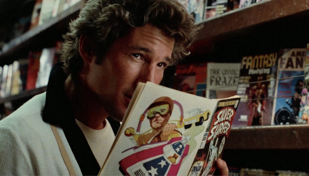 Richard Gere som leser Silver Surfer i filmen Breathless frå 1983.