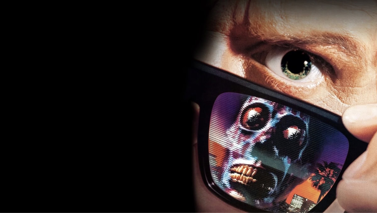 Ein poster av John Carpenter sin film "They Live" frå 1988