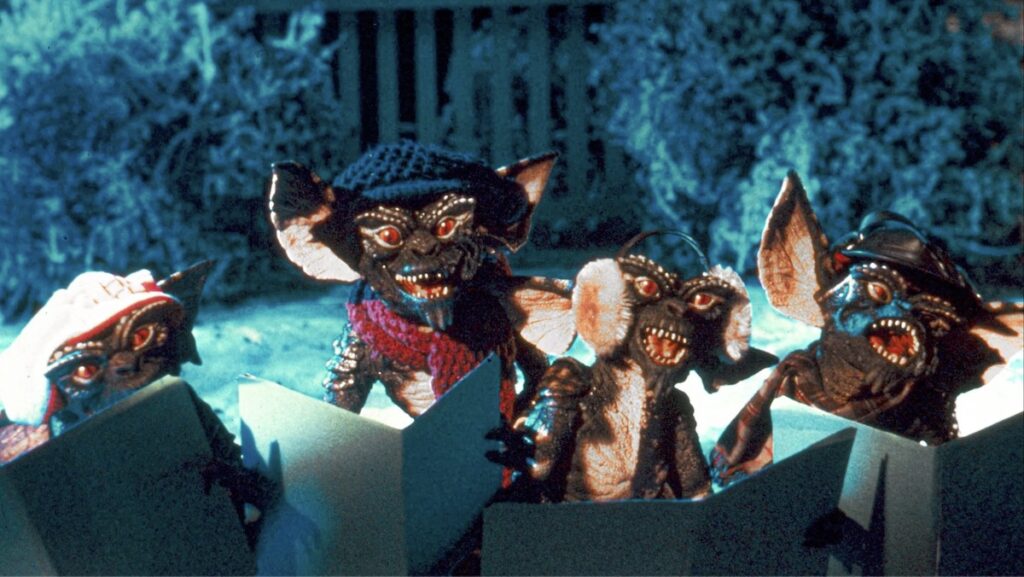 Monster som synger julesanger i frå skrekkfilmkomedia Gremlins (1984).