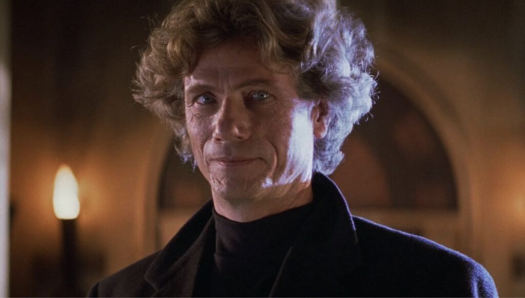 Jürgen Prochnow som Sutter Cane i John Carpenters In the Mouth of Madness.